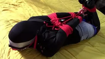 play Laura is bound and hooded on high heels and pantyhose, 10 minutes compilation of sexy bondage